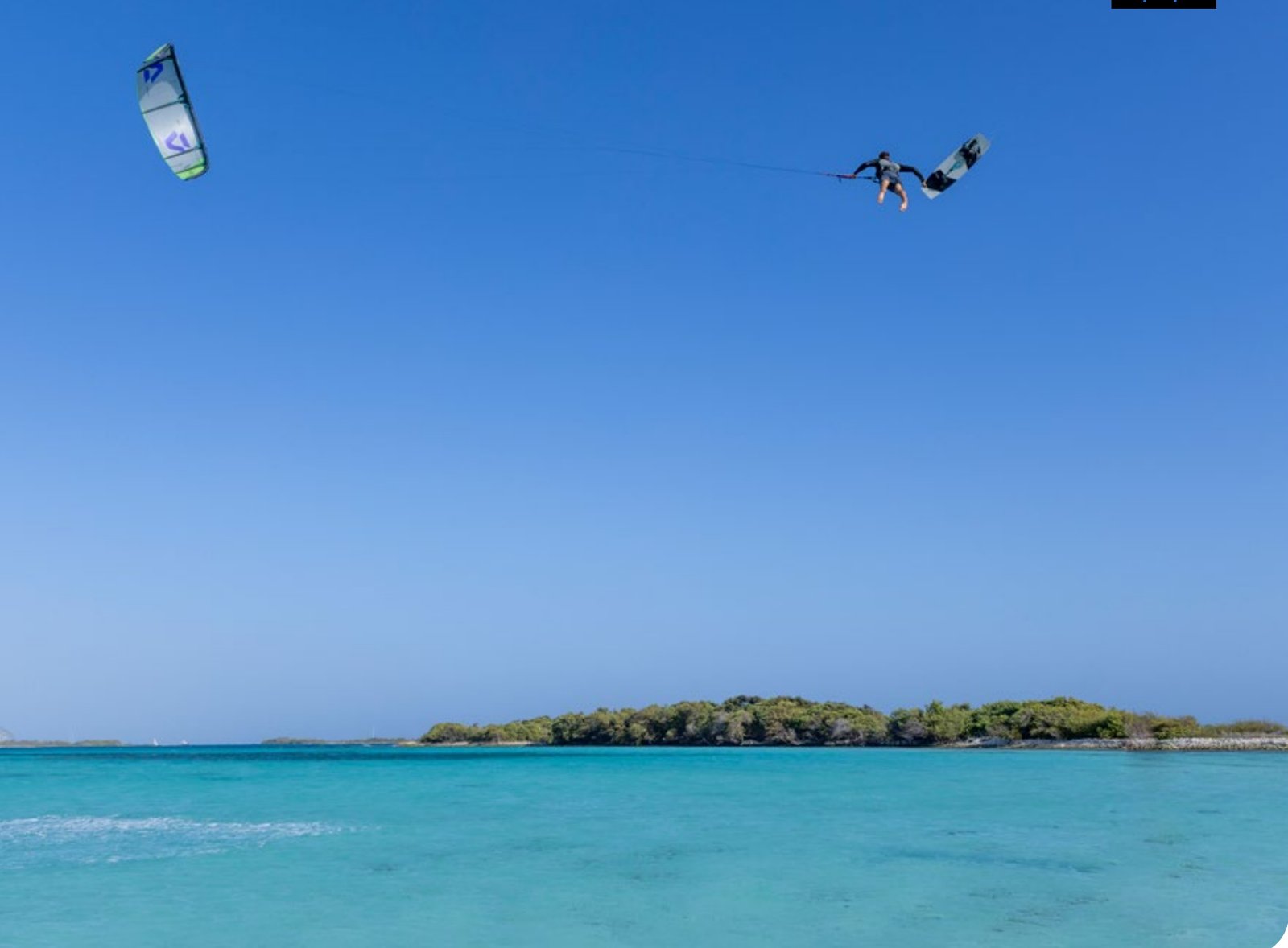 Kitesurfer boosting a big jump on a Duotone Rebel SLS 2027 kite
