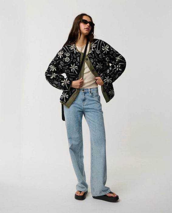 Rip Curl Bossa Nova Revo women’s reversible jacket in Military Green – full-length model view wearing the patterned side open