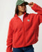 Rip Curl Every Day Zip Through Polar Fleece in red, front view with chest logo