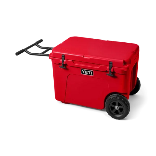 Yeti Tundra Haul red wheeled cooler with black handle, ideal for watersports and outdoor use