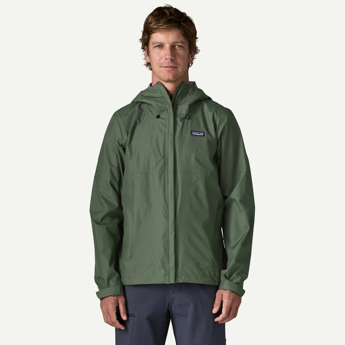 Patagonia Torrentshell 3L Rain Jacket in Canopy Green worn by a male model, front