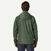 Patagonia Torrentshell 3L Rain Jacket in Canopy Green, back view on model
