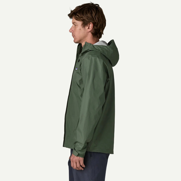 Patagonia Torrentshell 3L Rain Jacket in Canopy Green, side view on model
