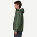 Patagonia Torrentshell 3L Rain Jacket in Canopy Green, side view on model