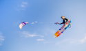 Rider jumping on the Harlem Launch V2 freeride kiteboard