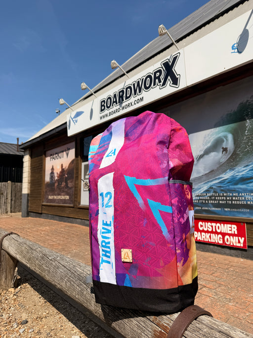 Harlmen thrive mk2 bag in front of Boardworx