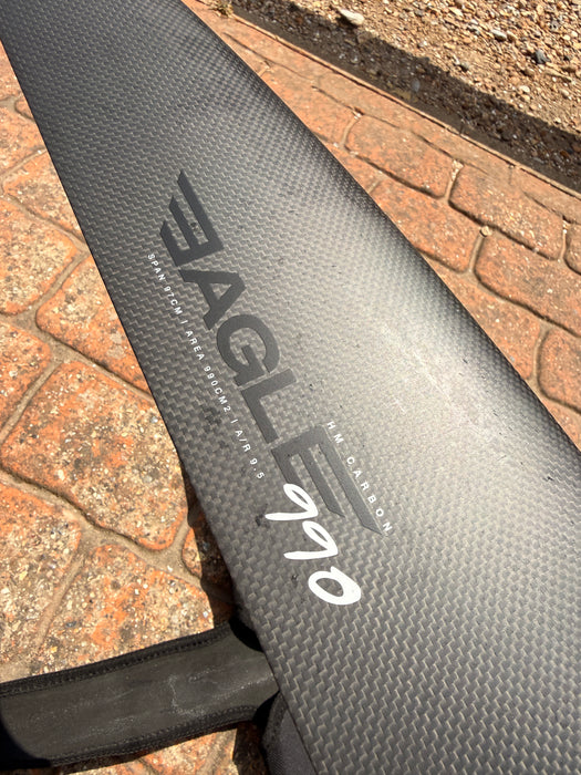 F-one Eagle 990 HM Carbon wing body showing specs label: span 97cm, area 990cm², aspect ratio 9.5, HM Carbon construction