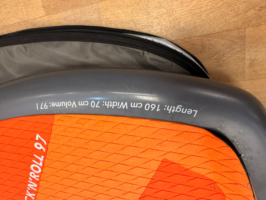 Close-up of orange board rail and surface condition