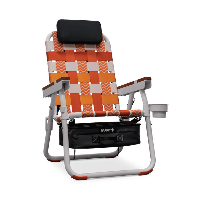 Parkit Eclipse Sunkissed reclining outdoor chair in upright position showing warm orange and cream woven pattern with built-in cooler compartment