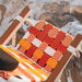 Parkit Eclipse Sunkissed chair showing built-in insulated cooler under seat with 2 exterior storage pockets