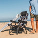 Parkit Eclipse Undertow in Enjoy recline position with faux teak armrests and aircraft-grade aluminium frame visible