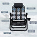 Parkit Eclipse Undertow reclining beach chair lifestyle shot in coastal setting showing ocean-tone woven webbing