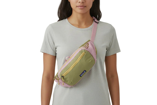 Two-toned Patagonia waist bag with pink and green colors on a white background