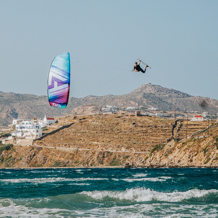 Kitesurfer boosting a big air jump on the Harlem Peak kite