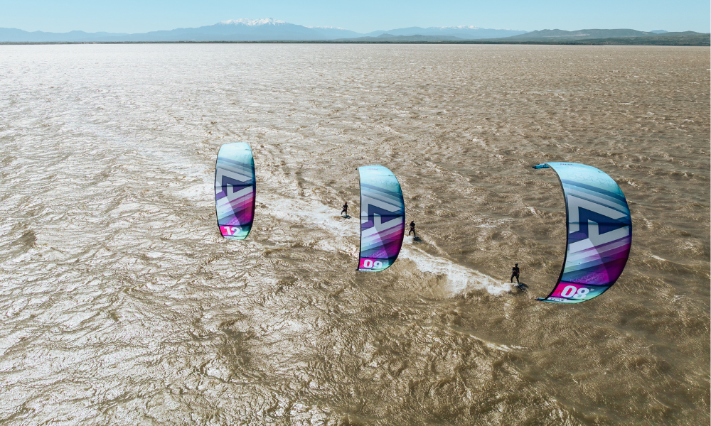 Harlem Peak kites flying over flat water