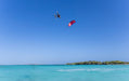 Duotone Jaime SLS 2027 during a freestyle aerial over a lagoon