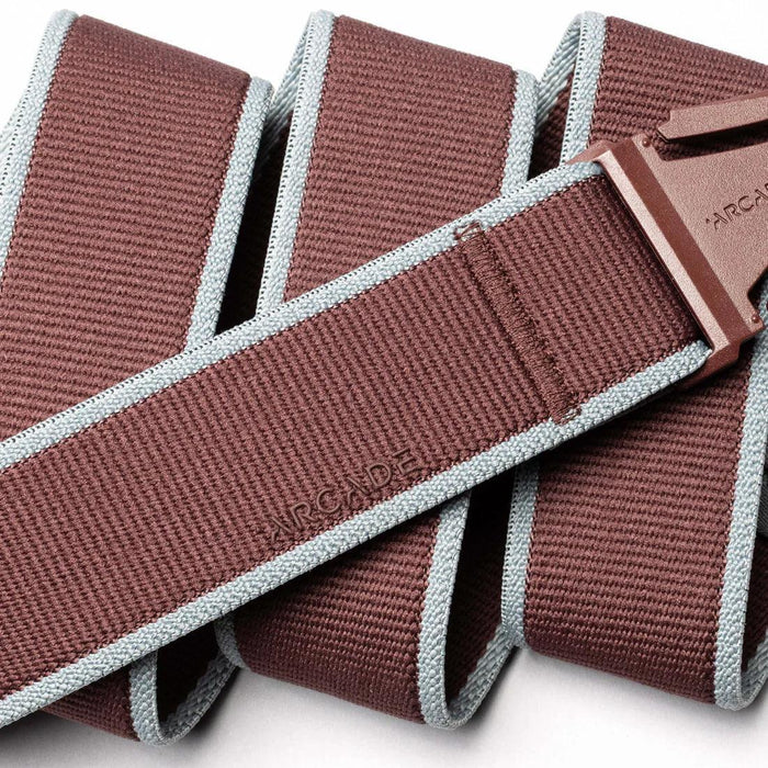 Arcade Carto belt in burgundy with light grey trim, outdoor accessory for watersports.