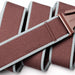 Arcade Carto belt in burgundy with light grey trim, outdoor accessory for watersports.