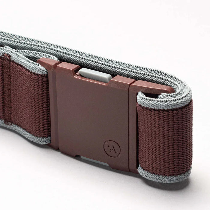 Arcade elastic belt with burgundy color and grey trim, plastic buckle detail