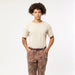 Arcade burgundy cloud belt on patterned trousers, casual surf clothing style.