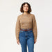 Arcade Carto burgundy stretch belt with blue accents, worn with jeans
