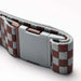 Arcade checkered belt with grey and burgundy pattern and grey buckle, closeup view