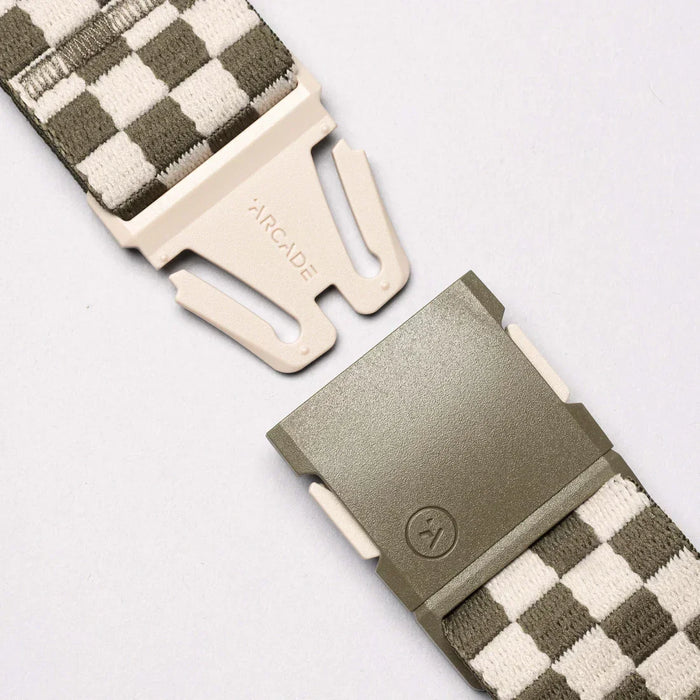 Arcade belt with khaki and white checkerboard pattern and plastic buckle close-up