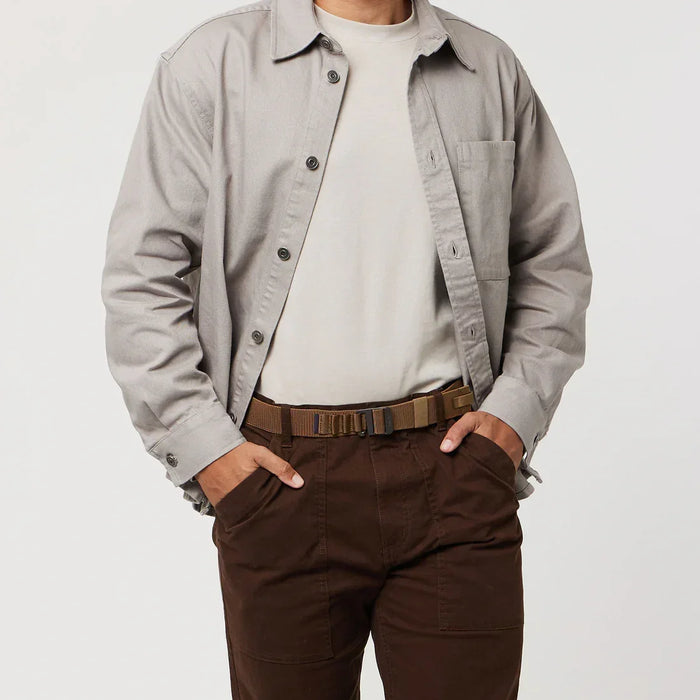 Arcade Alu Coyote belt with metal buckle, brown colour, worn with casual clothing.