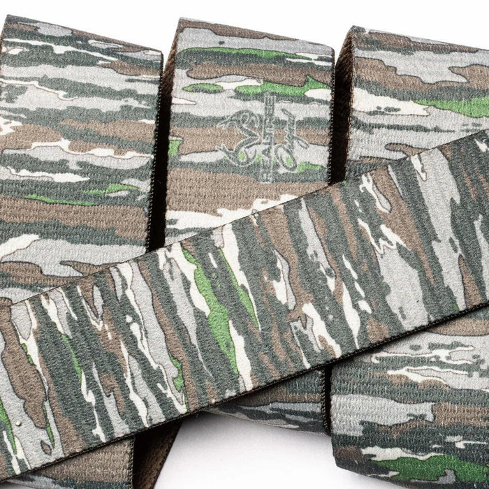 Arcade Realtree camo belt with green, brown, and grey woodland pattern