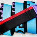 Arcade blue and black belt with acid fade pattern and purple buckle, watersports accessory