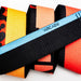 Arcade Sierra Acid Fade belt in orange, yellow, and black with blue accent, close-up