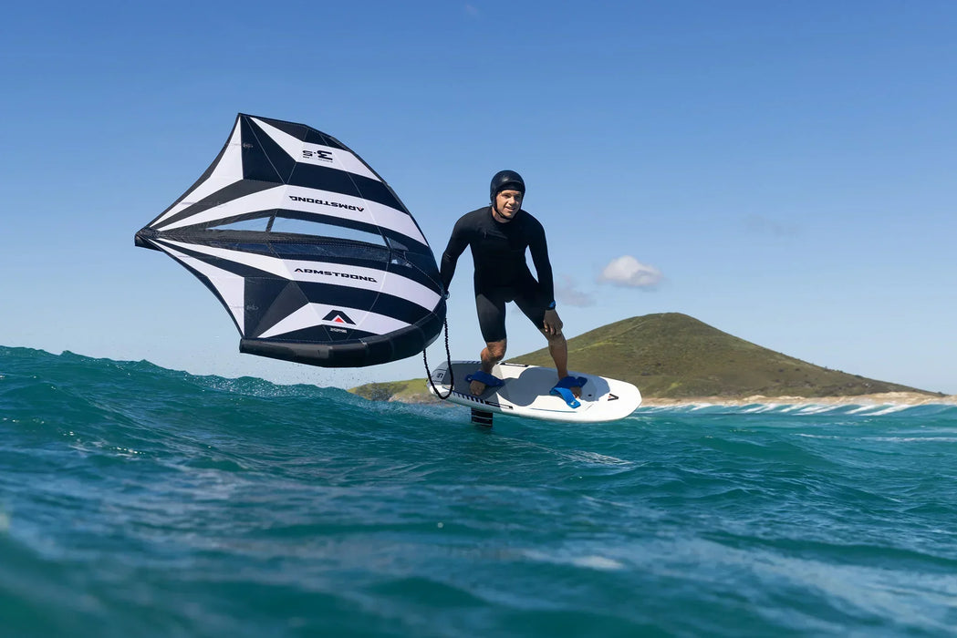 Armstrong A-Wing XPS MKII black and white wing foil in use on the ocean