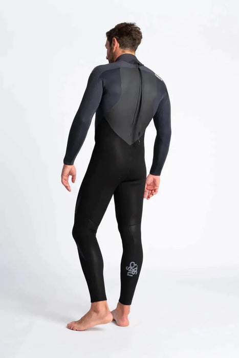 Man wearing C-Skins Legend 5/4/3 GBS back zip wetsuit in black, rear view
