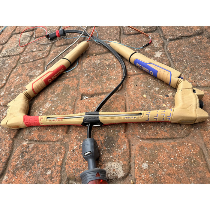 Used Duotone Click Bar S/M kite control bar, full bar with red depower and blue power grips and centre Duotone housing