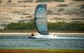 Duotone EVO SLS kitesurfing kite with blue accents in use on water