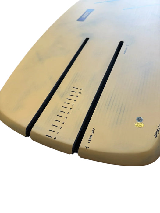 Duotone kite foil board close-up, beige color with slot tracks and lift adjustment markings