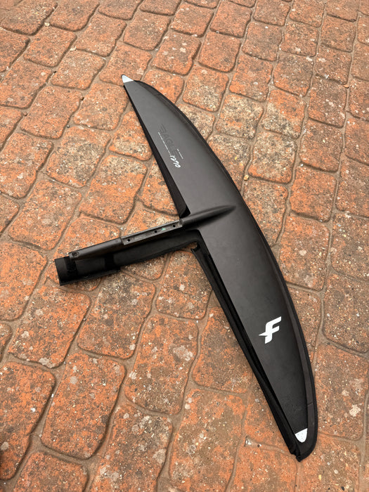 Underside view of used F-one Eagle 1290 HM Carbon front wing showing F-one lightning bolt logo, EAGLE 1290 markings and fuselage stub