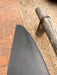 Close-up of wingtip underside of used F-one Eagle 1290 HM Carbon front wing showing clean carbon surface
