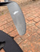 Close-up of wingtip of used F-one Sk8 V2 850 showing F-one lightning bolt logo and surface scuffs near trailing edge — disclosed cosmetic marks