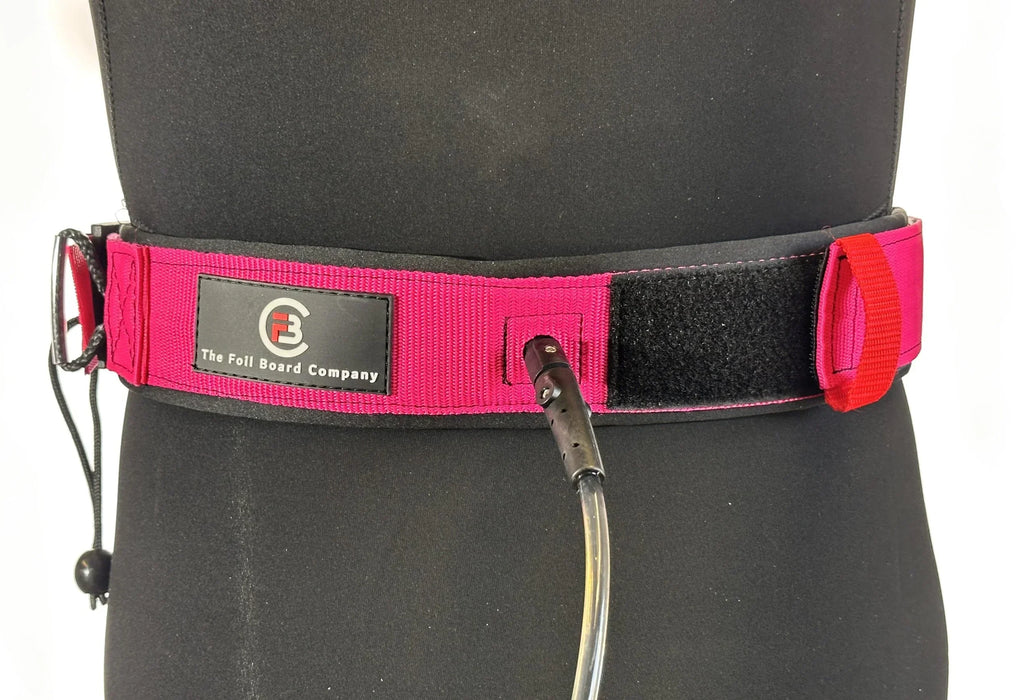 The Foil Board Company waist leash for paddleboard and surf in red with black velcro strap.