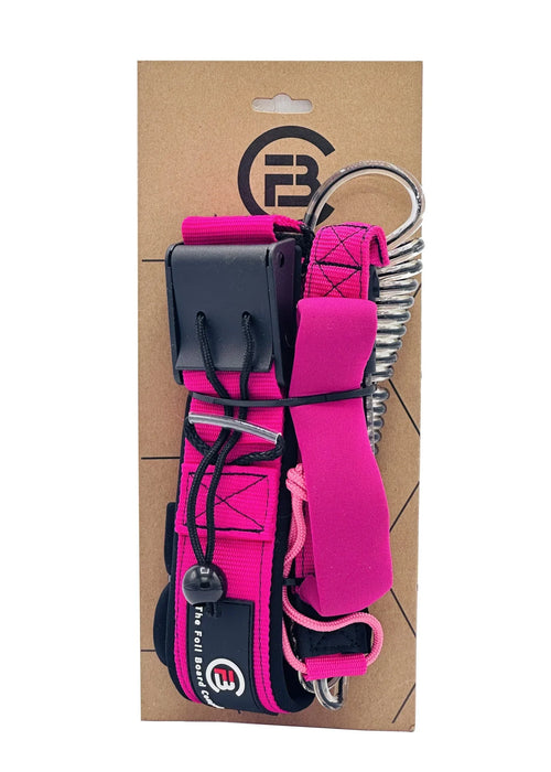 FBC pink waist leash for paddleboard or foil board, coiled cord, in packaging.