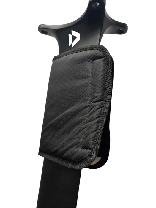 Duotone foil mast with black padded shoulder saver carry pad for watersports