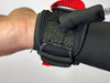Black wing wrist leash with red pull tab for wing foiling shown on wrist