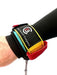 Foil Board Company wrist wing foil leash with black, yellow, and red strap detail