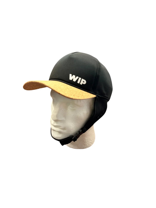 WIP black watersports cap helmet with chin strap and tan peak
