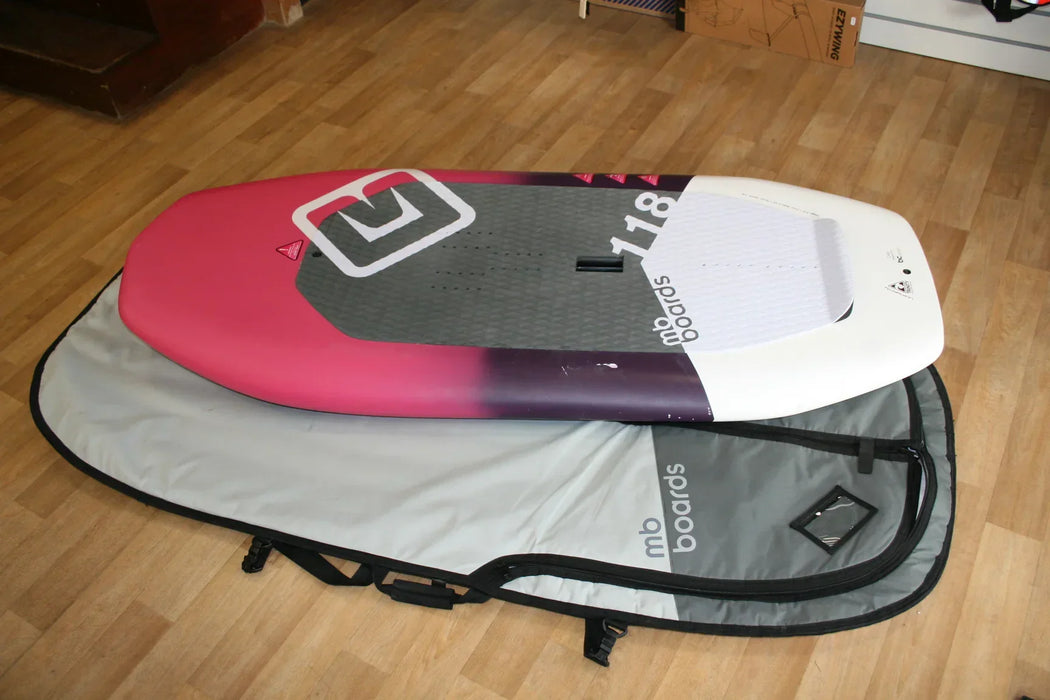 MB Boards Albatros 118L wingfoil board in pink, grey, and white with board bag