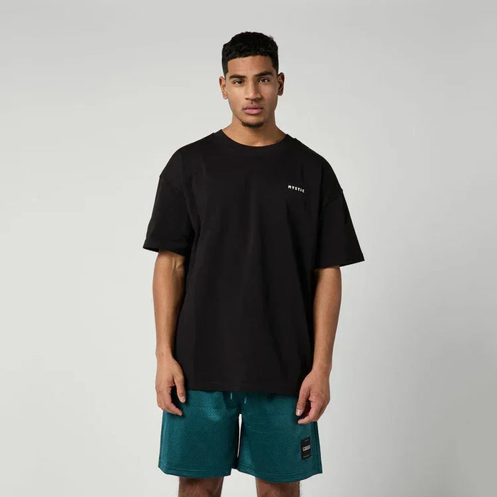 Mystic black profile tee for watersports, logo on chest, worn by male model