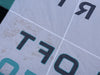 Close-up of cosmetic colour bleed staining on the white canopy of the used North Loft Pro wing