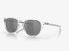 Oakley Pitchman R sunglasses with clear frame and black lenses, ideal for watersports