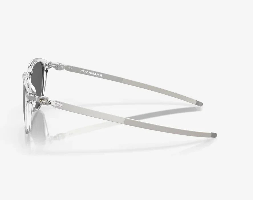 Oakley Pitchman R sunglasses with clear polished frame and black lenses, side view